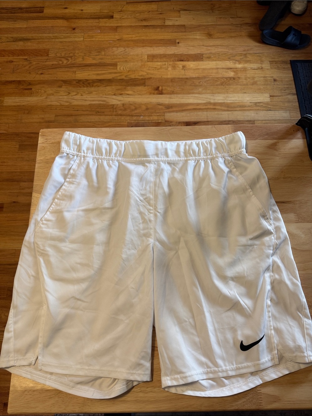 Nike Men’s White Athletic Shorts with Black Swoosh Logo